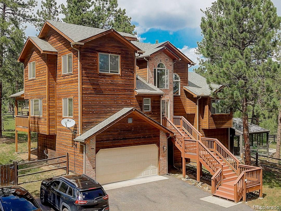 25 Buggy Whip Road Bailey, CO 80421 - Photo 1 of 40 a view of a car park in front of house