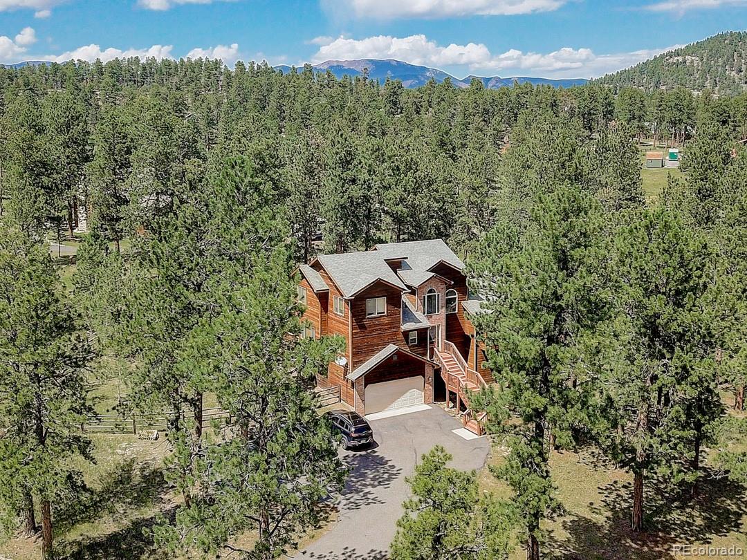 25 Buggy Whip Road Bailey, CO 80421 - Photo 3 of 40 an aerial view of a house with a yard