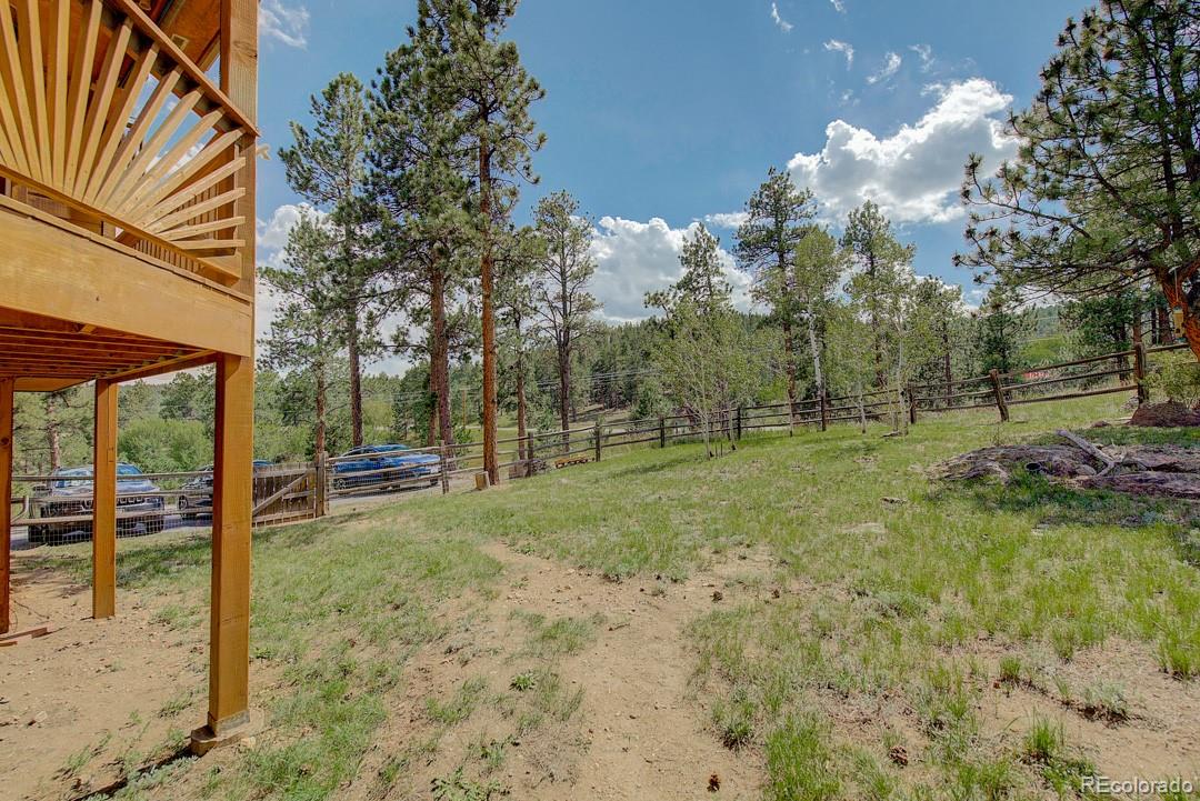 25 Buggy Whip Road Bailey, CO 80421 - Photo 37 of 40 a view of a yard with entertaining space