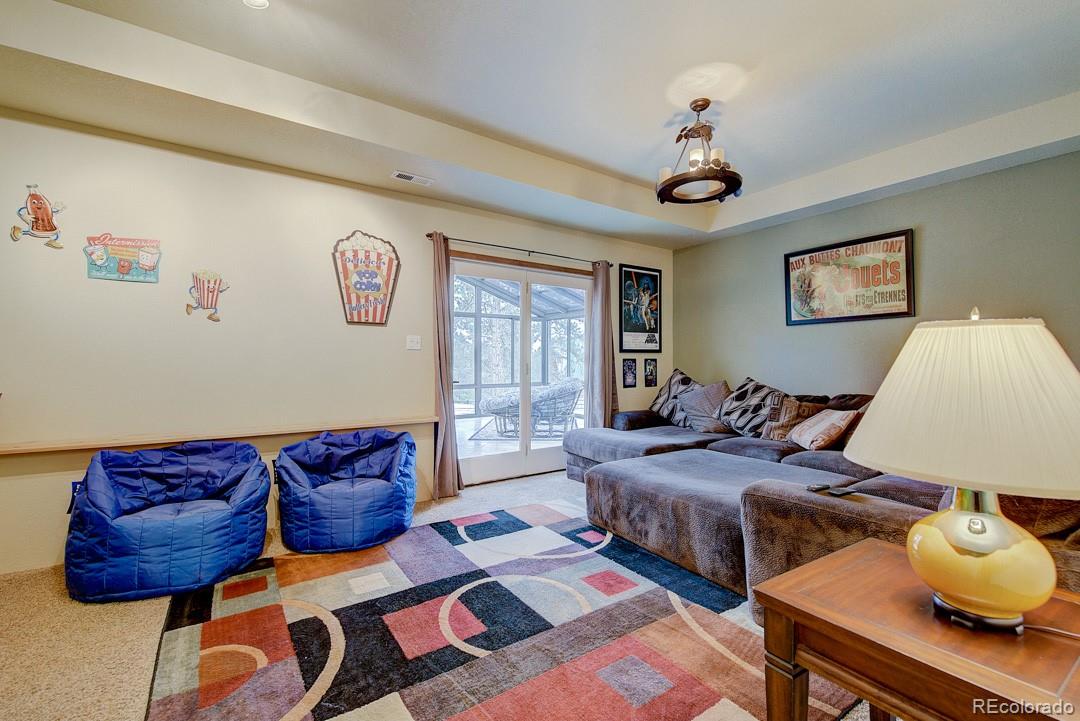 25 Buggy Whip Road Bailey, CO 80421 - Photo 10 of 40 a bedroom with two beds and a window