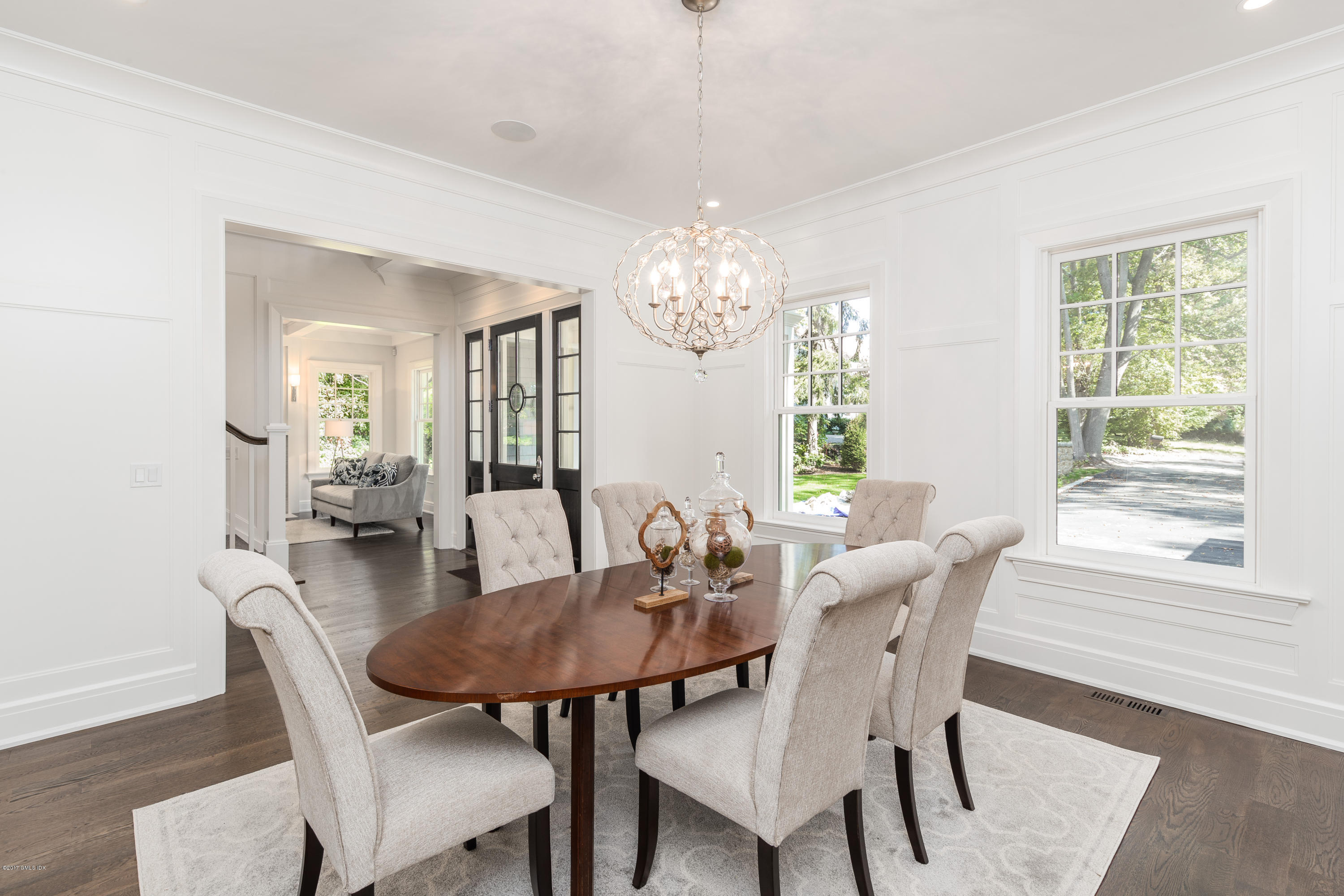 9 Shaw Place Riverside, CT 06878 - Photo 13 of 39 a view of a dining room with furniture window and wooden floor
