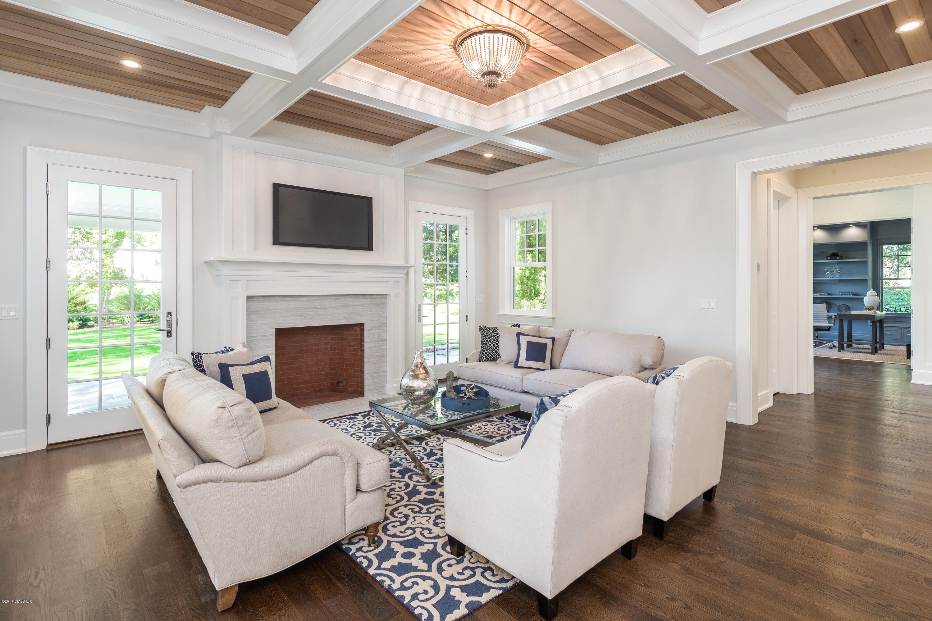 9 Shaw Place Riverside, CT 06878 - Photo 19 of 39 a living room with furniture fireplace and flat screen tv