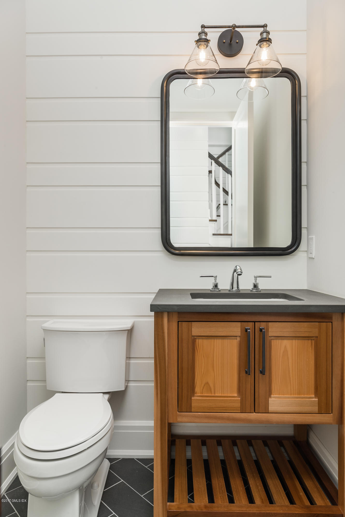 9 Shaw Place Riverside, CT 06878 - Photo 20 of 39 a bathroom with a toilet sink and mirror