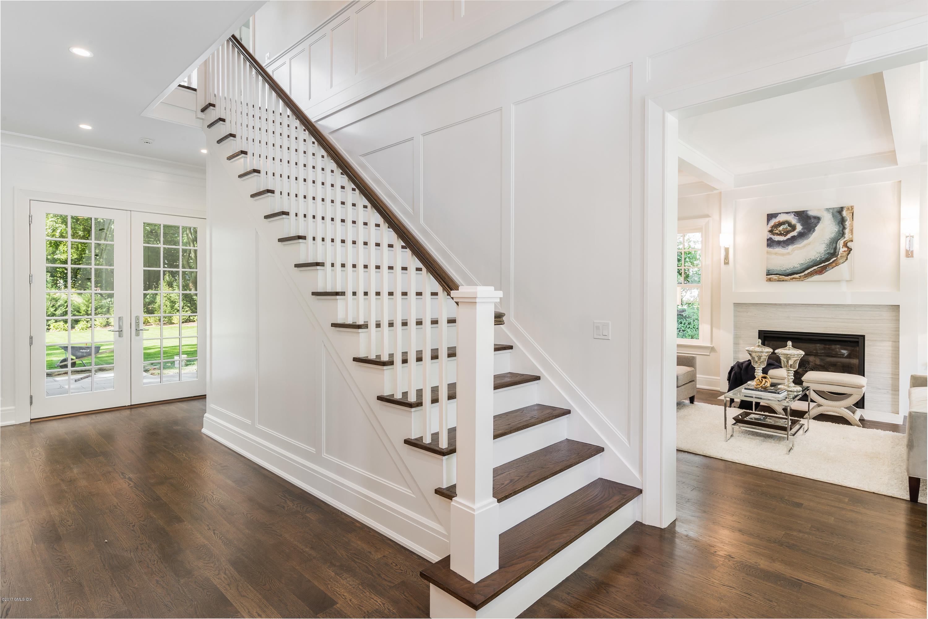 9 Shaw Place Riverside, CT 06878 - Photo 22 of 39 a view of entryway livingroom and hall with wooden floor