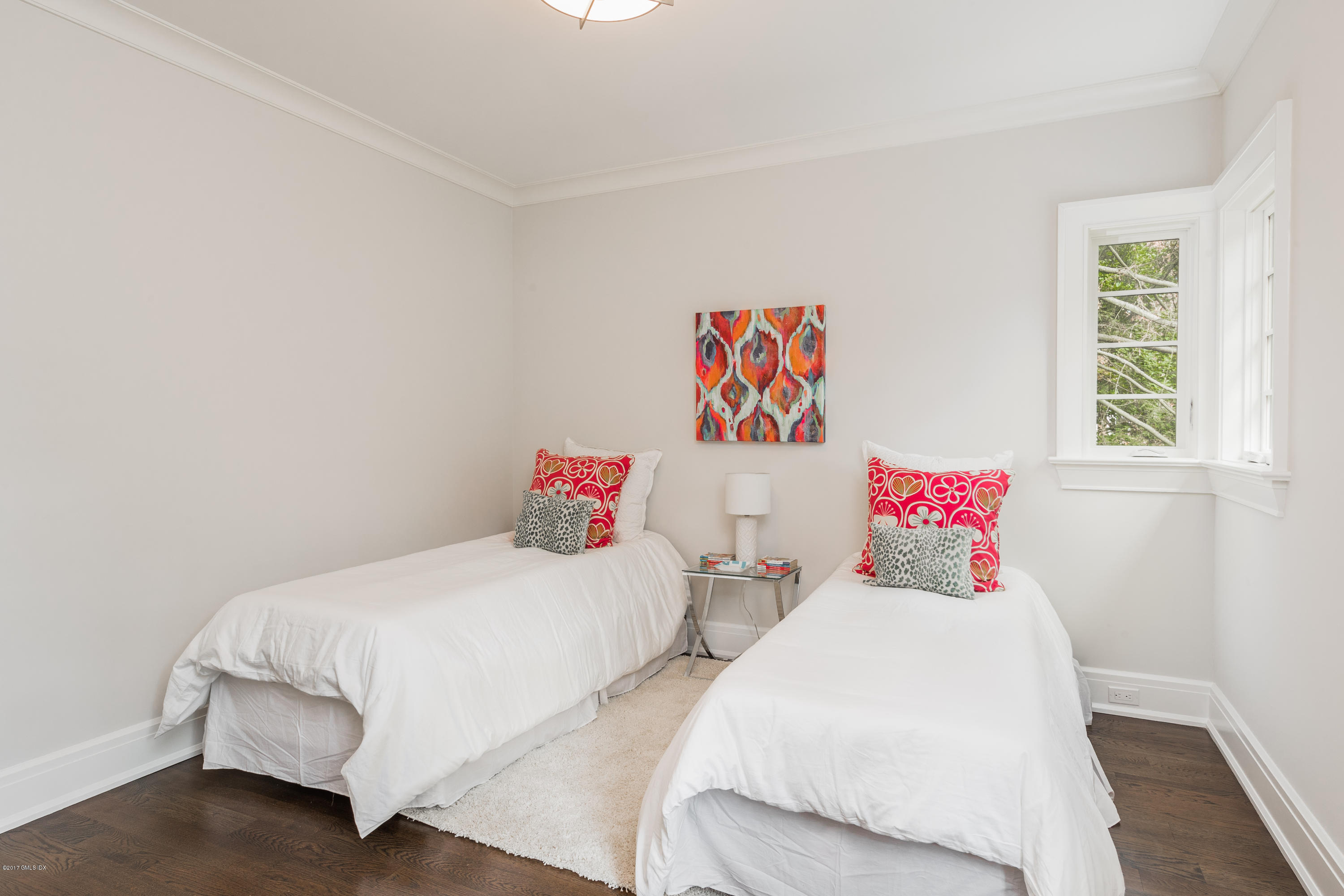 9 Shaw Place Riverside, CT 06878 - Photo 29 of 39 a bedroom with two bed and a window