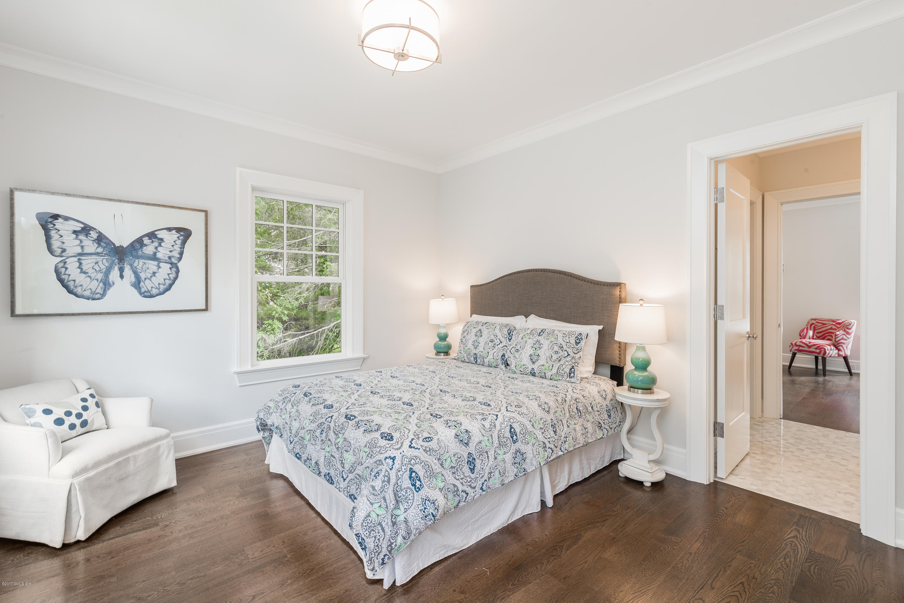 9 Shaw Place Riverside, CT 06878 - Photo 30 of 39 a bedroom with a bed and a couch