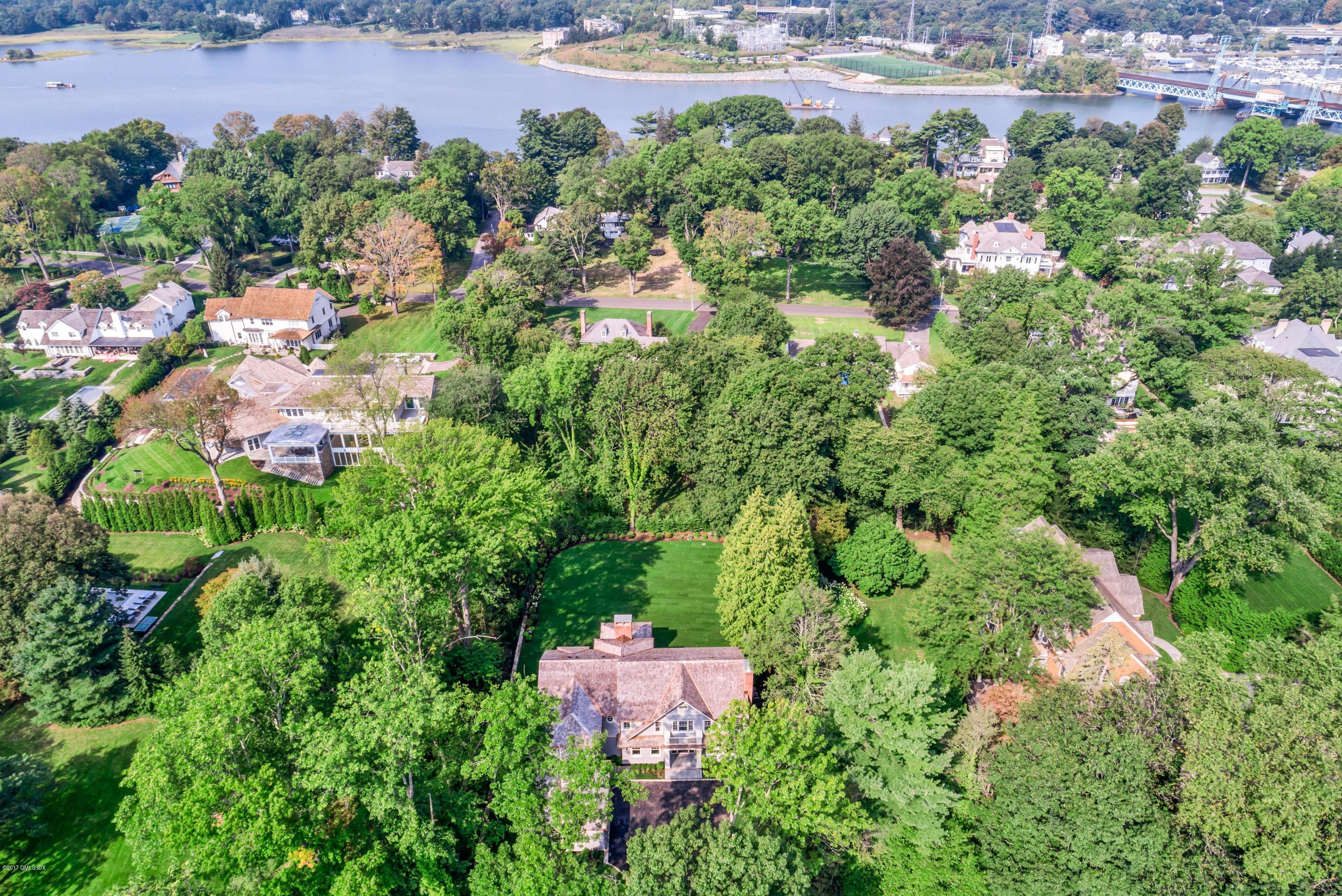 9 Shaw Place Riverside, CT 06878 - Photo 39 of 39 an aerial view of a house with a yard and lake view