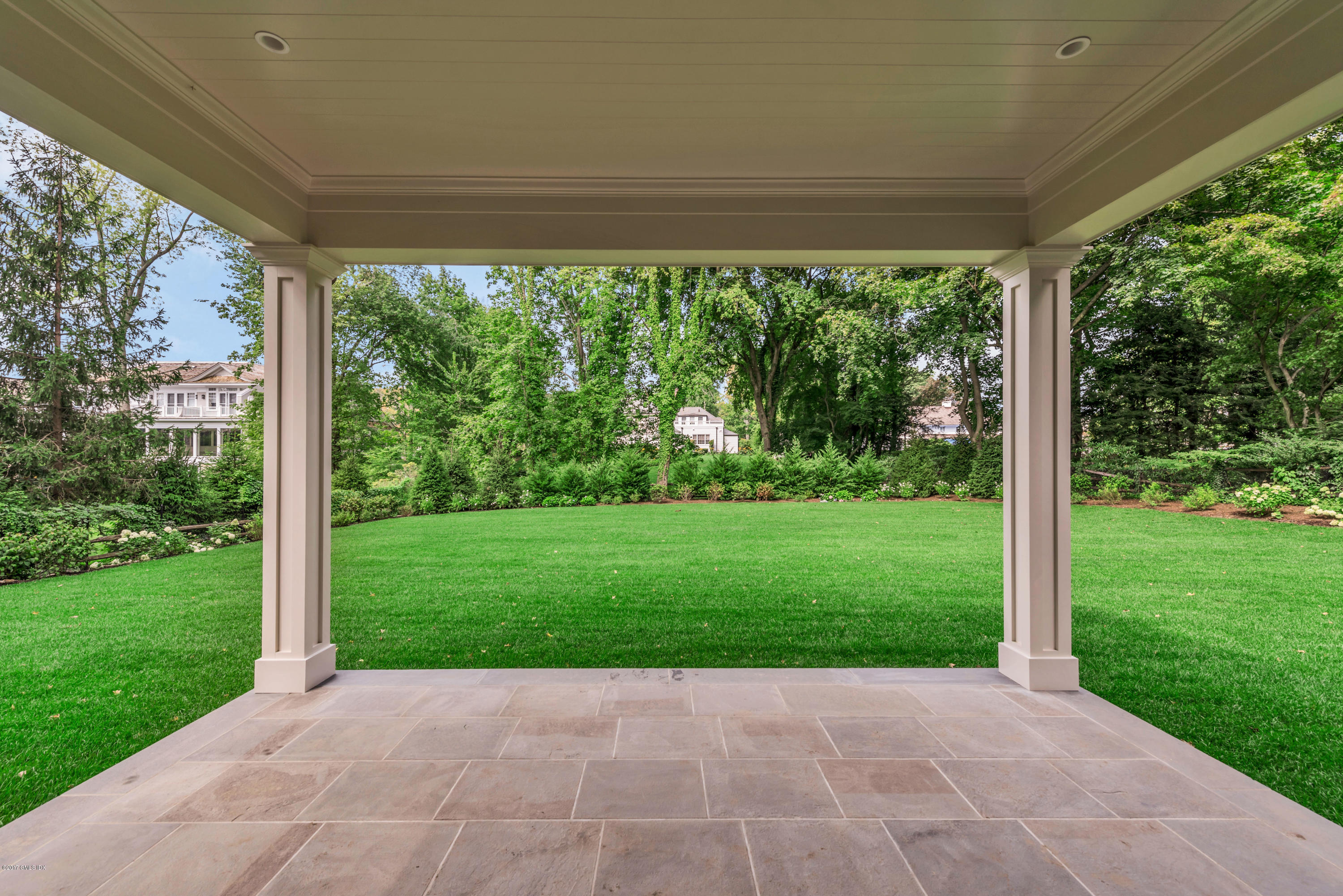 9 Shaw Place Riverside, CT 06878 - Photo 6 of 39 a view of backyard with green space