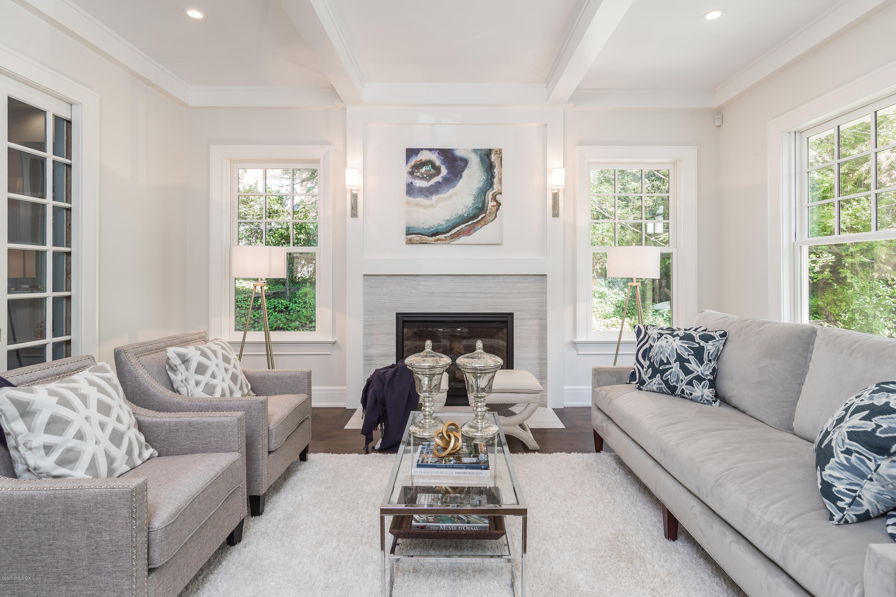 9 Shaw Place Riverside, CT 06878 - Photo 10 of 39 a living room with furniture and a fireplace