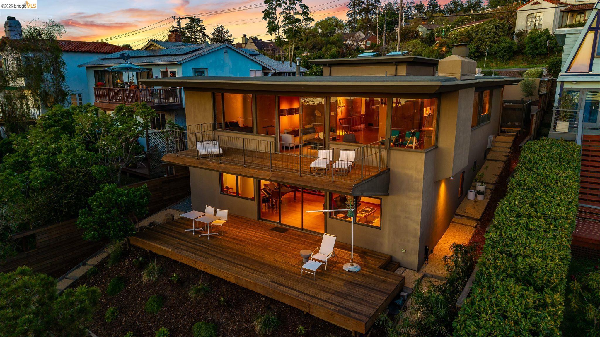 606 Grizzly Peak Boulevard Berkeley, CA 94708 - Photo 1 of 1 a view of a balcony with two chairs and a table