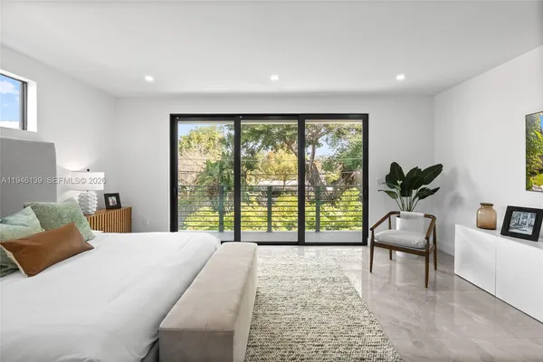 a view of walk in closet with white walls