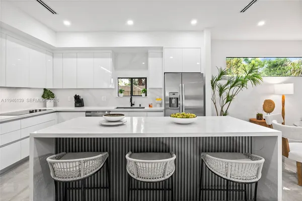 a living room with furniture and a table