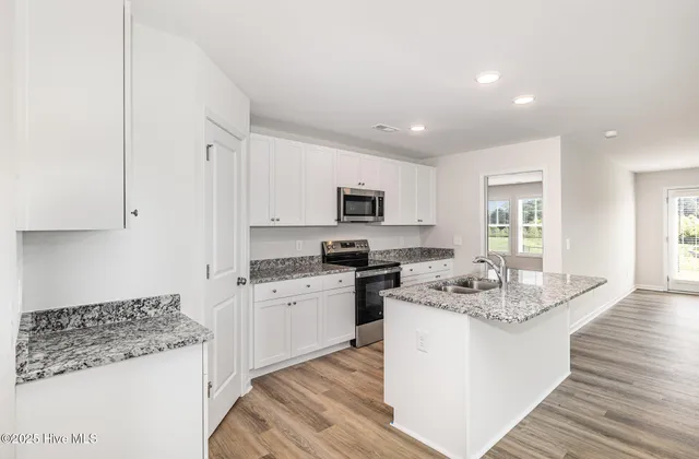 $309,950 | 8 West Emily Gardens Drive, Selma, NC 27576