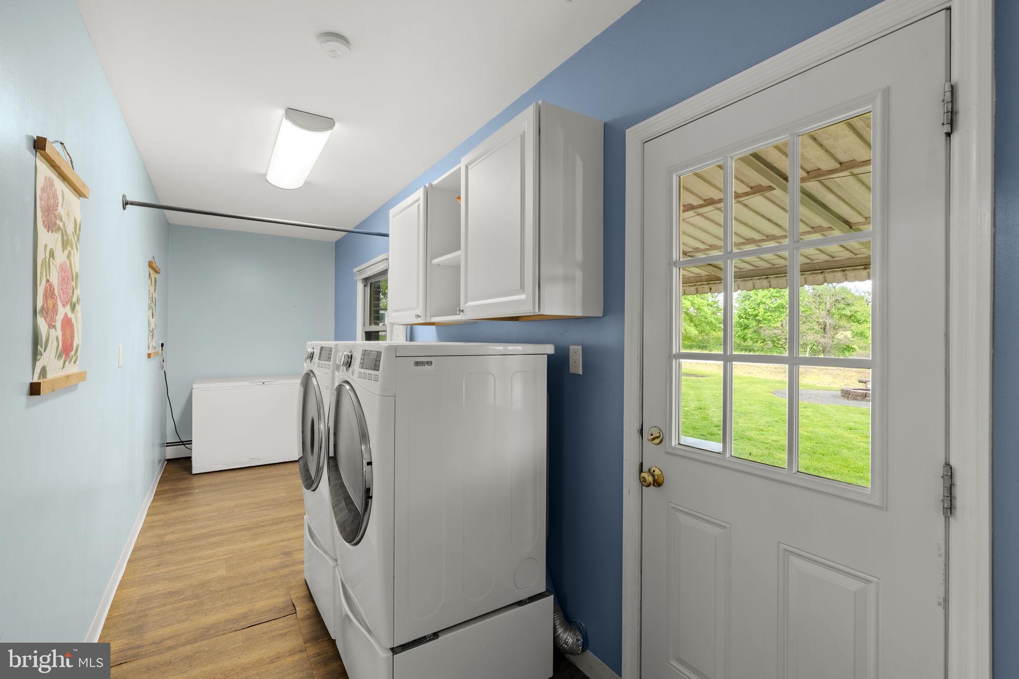 1160 Narvon Road Narvon, PA 17555 - Photo 47 of 64 a utility room with cabinets dryer and washer