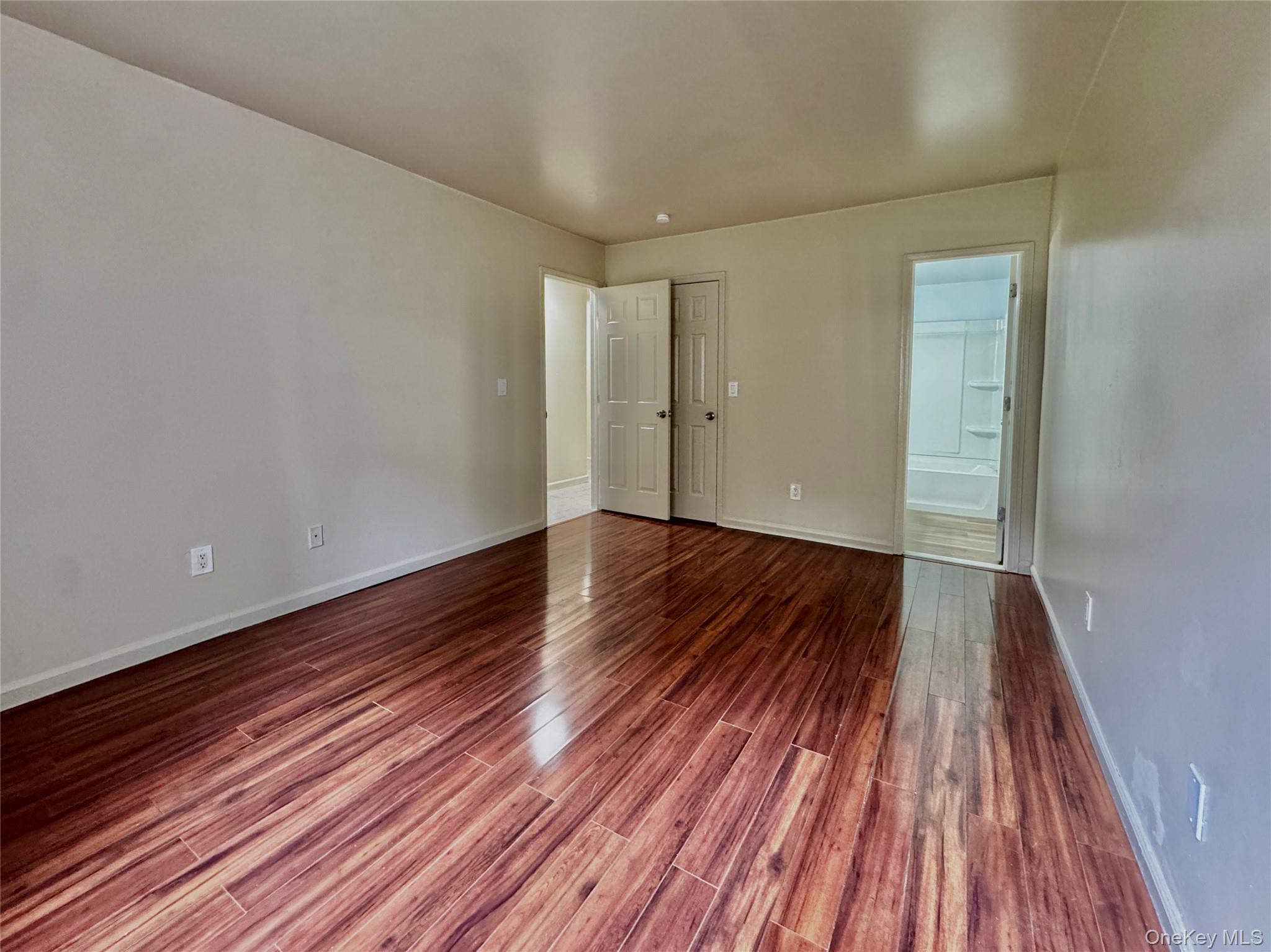 5 Lexington Hills Road, Unit 7 Harriman, NY 10926 - Photo 15 of 21 a view of wooden floor in a hall with an entryway