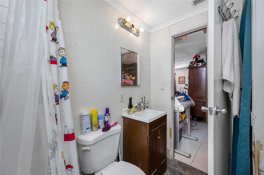 1324 Milton Street Clearwater, FL 33756 - Photo 19 of 47 a bathroom with a sink toilet vanity and tub