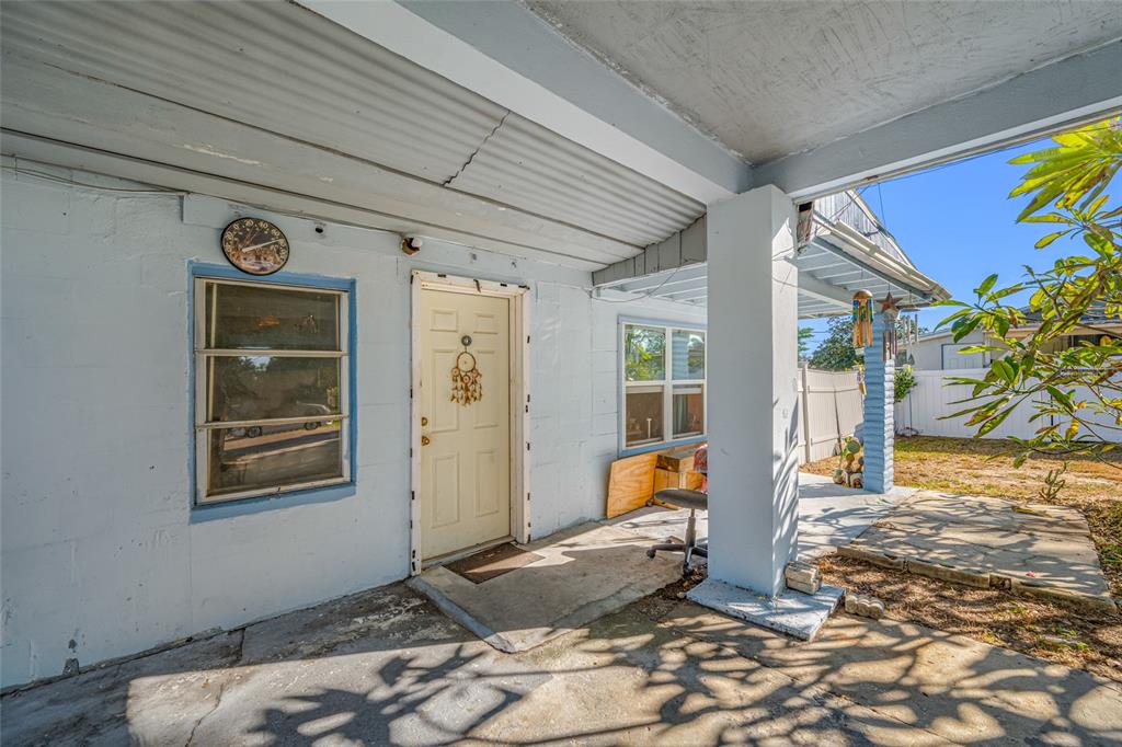 1324 Milton Street Clearwater, FL 33756 - Photo 26 of 47 a front view of a house with a yard