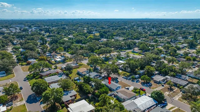 an aerial view of a city with lots of residential buildings