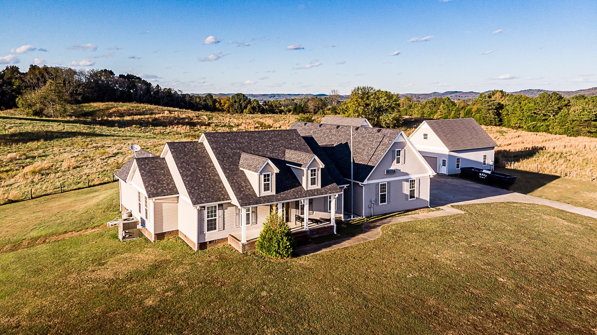 1555 Poplar Hill Road Prospect, TN 38477 - Photo 1 of 29 a view of a house with a mountain