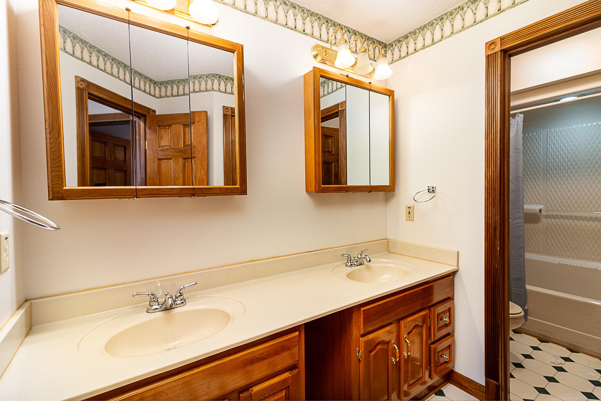 1555 Poplar Hill Road Prospect, TN 38477 - Photo 12 of 29 a bathroom with a sink and a mirror