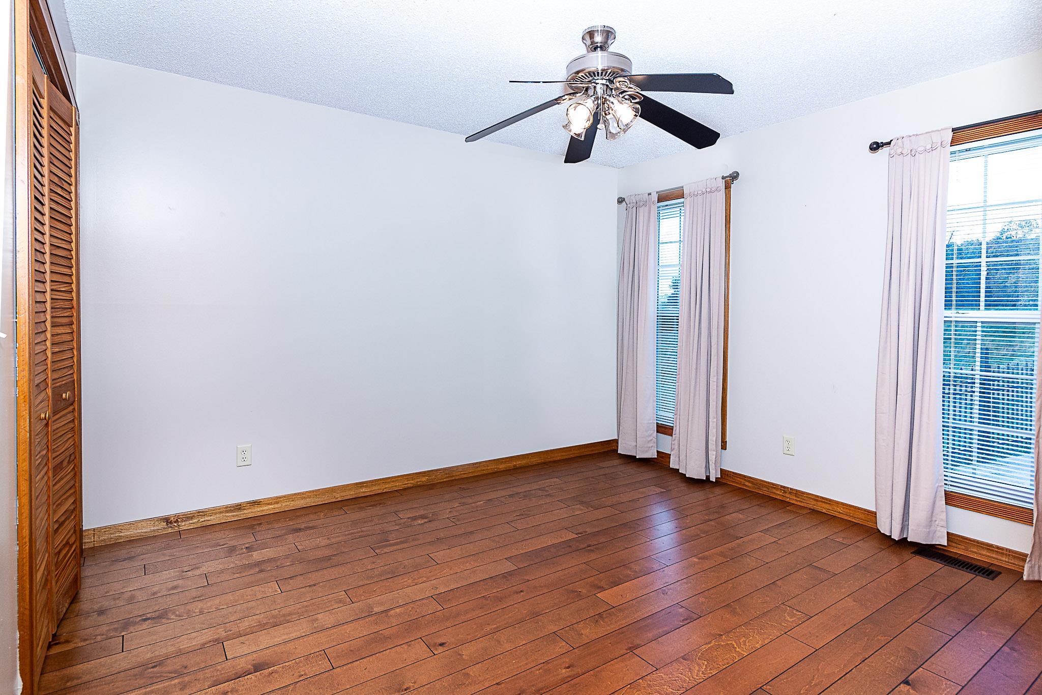 1555 Poplar Hill Road Prospect, TN 38477 - Photo 13 of 29 a view of room with wooden floor and ceiling fan