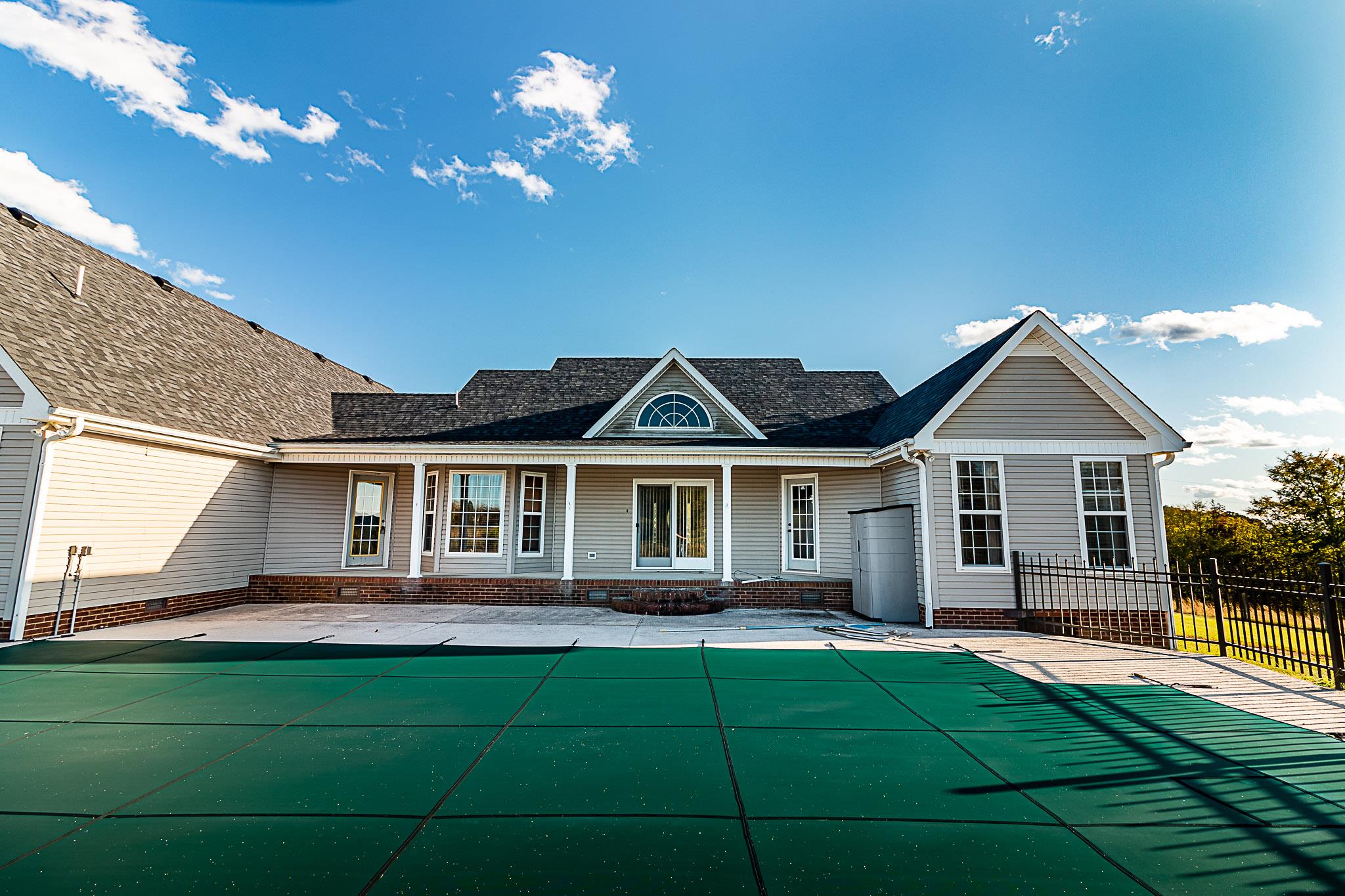 1555 Poplar Hill Road Prospect, TN 38477 - Photo 19 of 29 a front view of a house with yard