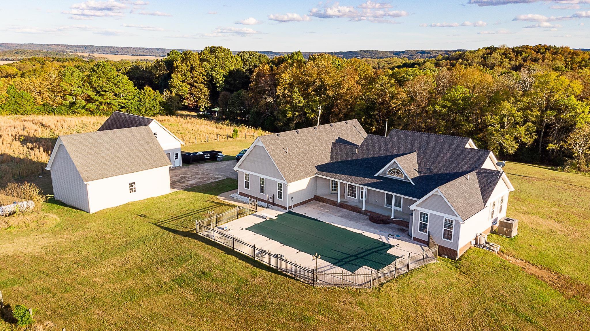 1555 Poplar Hill Road Prospect, TN 38477 - Photo 24 of 29 a view of a patio with swimming pool