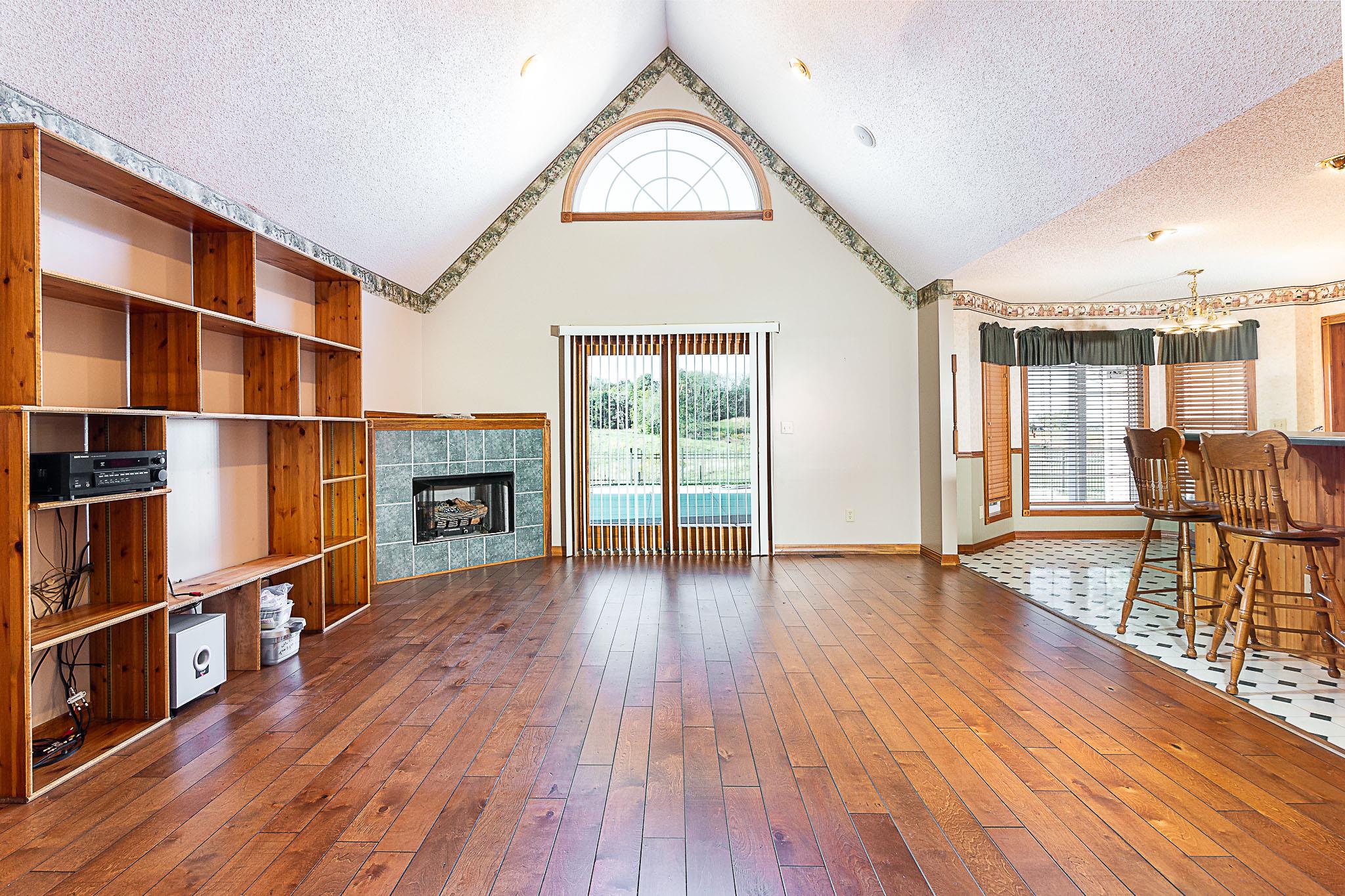 1555 Poplar Hill Road Prospect, TN 38477 - Photo 5 of 29 a view of a livingroom with furniture wooden floor and window