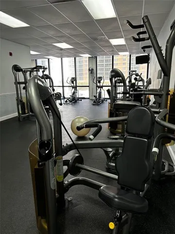 a group of people sitting at tables in a room
