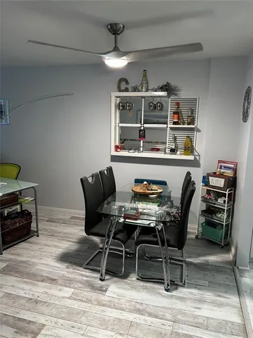 a view of a workspace with furniture