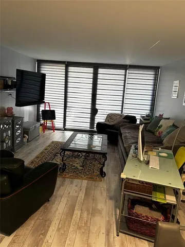 a kitchen with a stove and a microwave