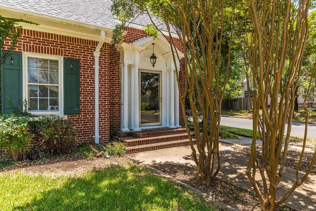 2228 Parrott Avenue Waco, TX 76707 - Photo 1 of 1 a front view of a house with a tree
