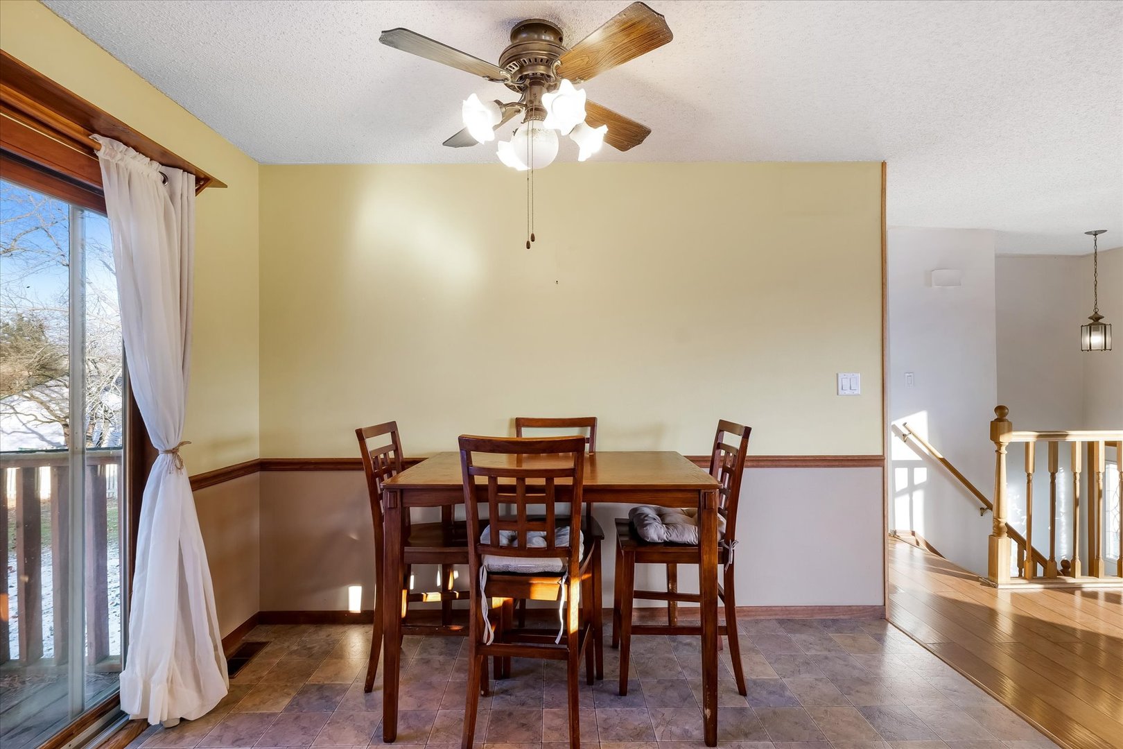 104 Grant Street Philo, IL 61864 - Photo 16 of 44 a view of a dining room with furniture and wooden floor