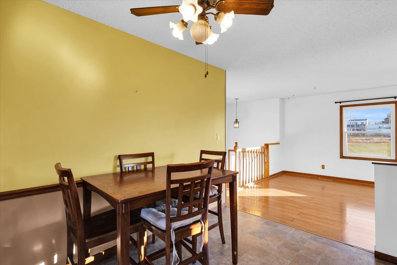 104 Grant Street Philo, IL 61864 - Photo 17 of 44 a view of a dining room with furniture and a chandelier