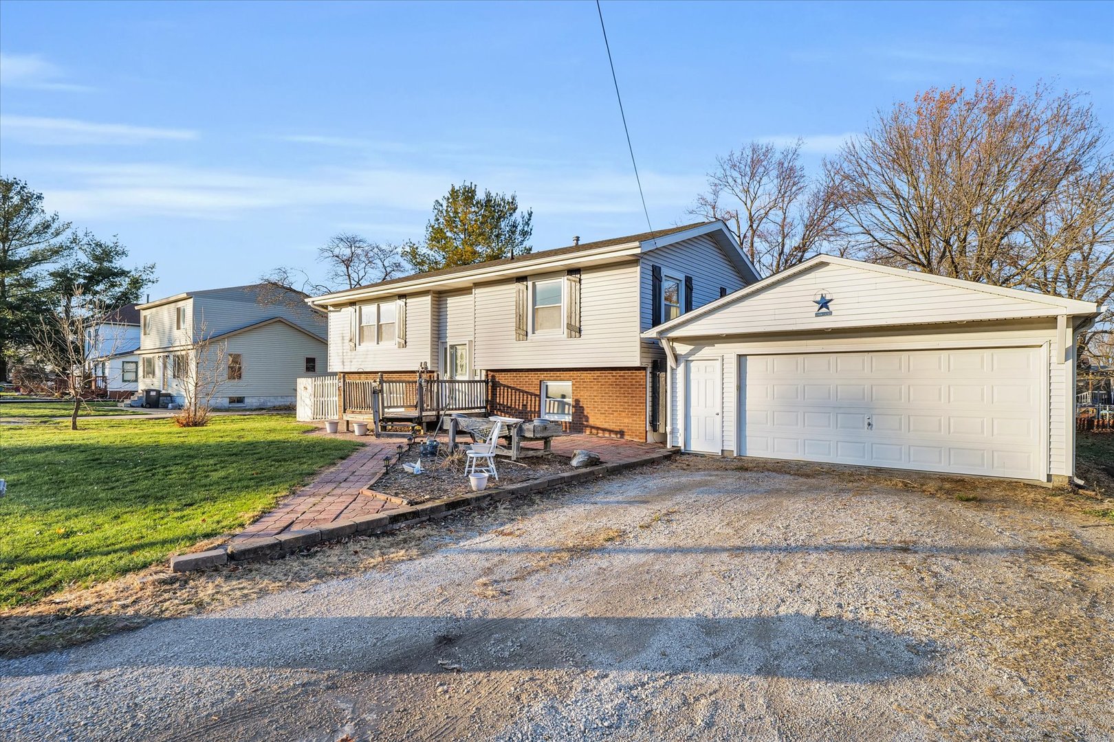 104 Grant Street Philo, IL 61864 - Photo 2 of 44 a view of a house with a yard