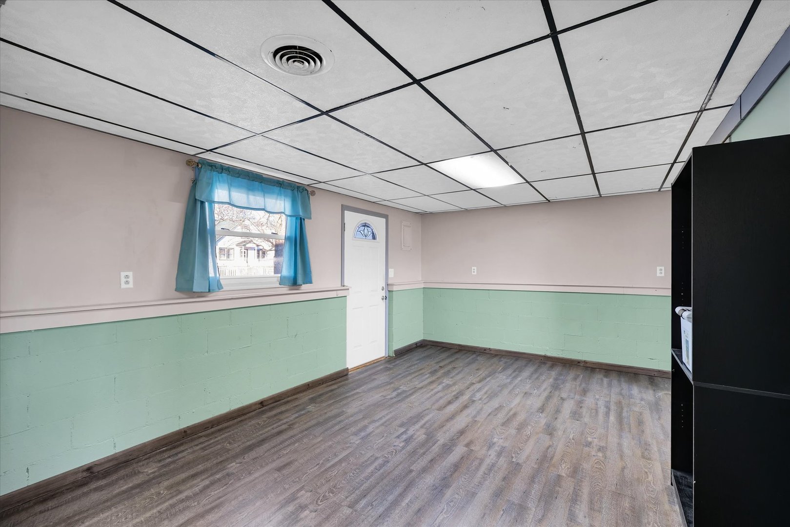 104 Grant Street Philo, IL 61864 - Photo 26 of 44 a view of a room with window and wooden floor