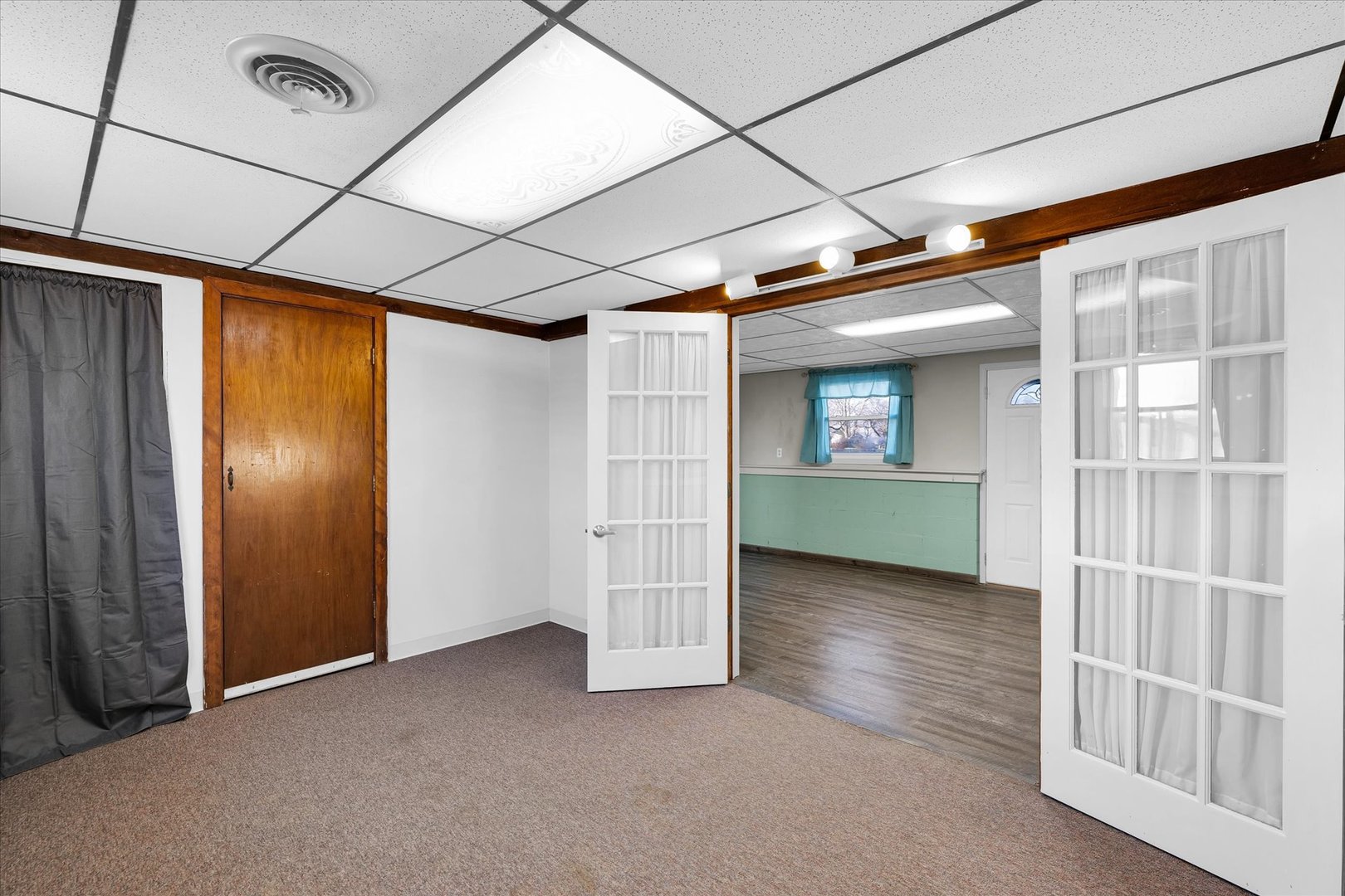 104 Grant Street Philo, IL 61864 - Photo 30 of 44 a view of an empty room with wooden floor and entryway