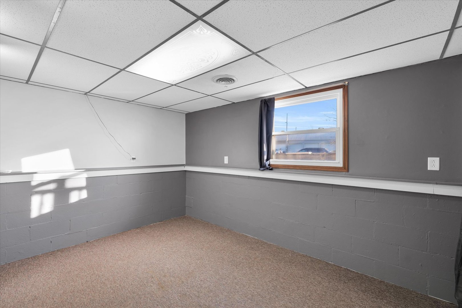 104 Grant Street Philo, IL 61864 - Photo 31 of 44 a view of an empty room with a window