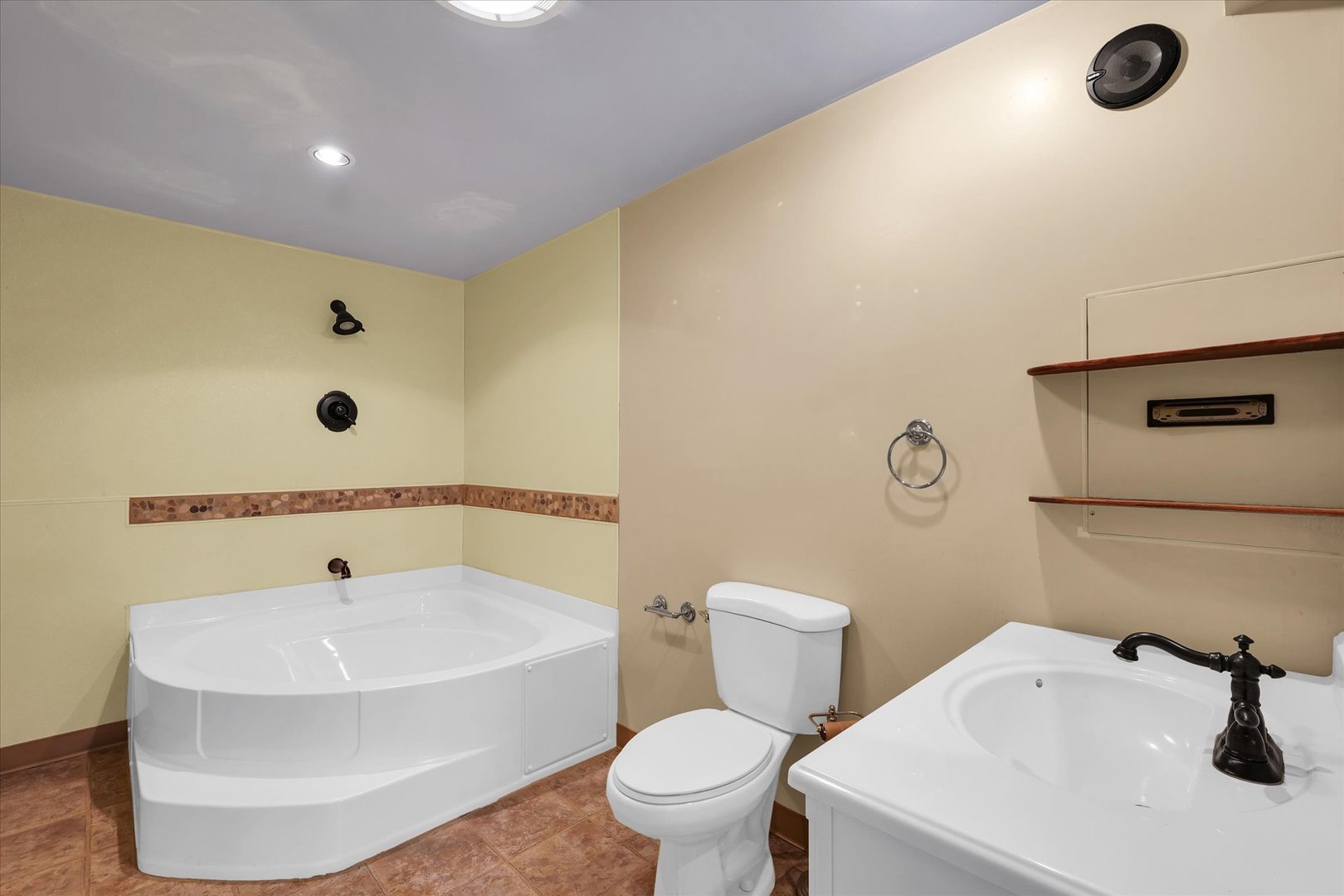 104 Grant Street Philo, IL 61864 - Photo 34 of 44 a bathroom with a sink a toilet and a mirror