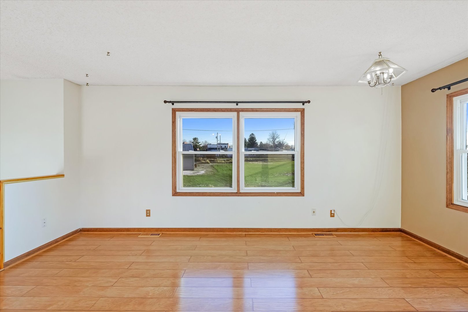104 Grant Street Philo, IL 61864 - Photo 9 of 44 a view of an empty room with a window