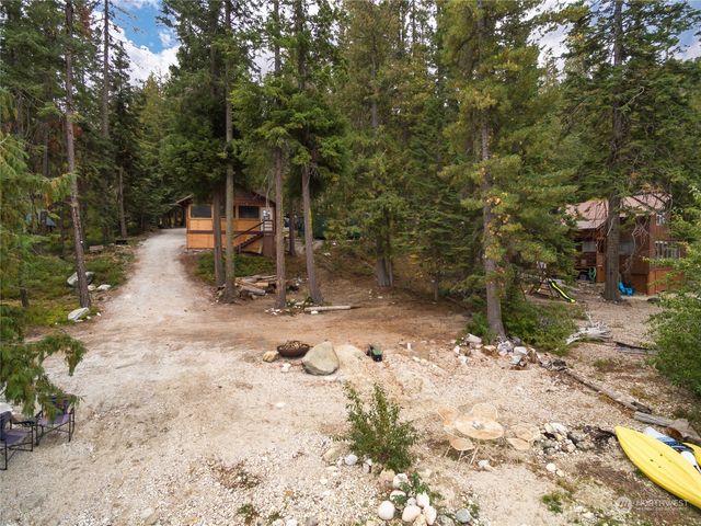 a view of a park with large trees