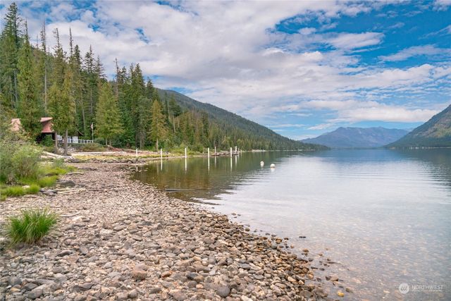 a view of a lake with a yard