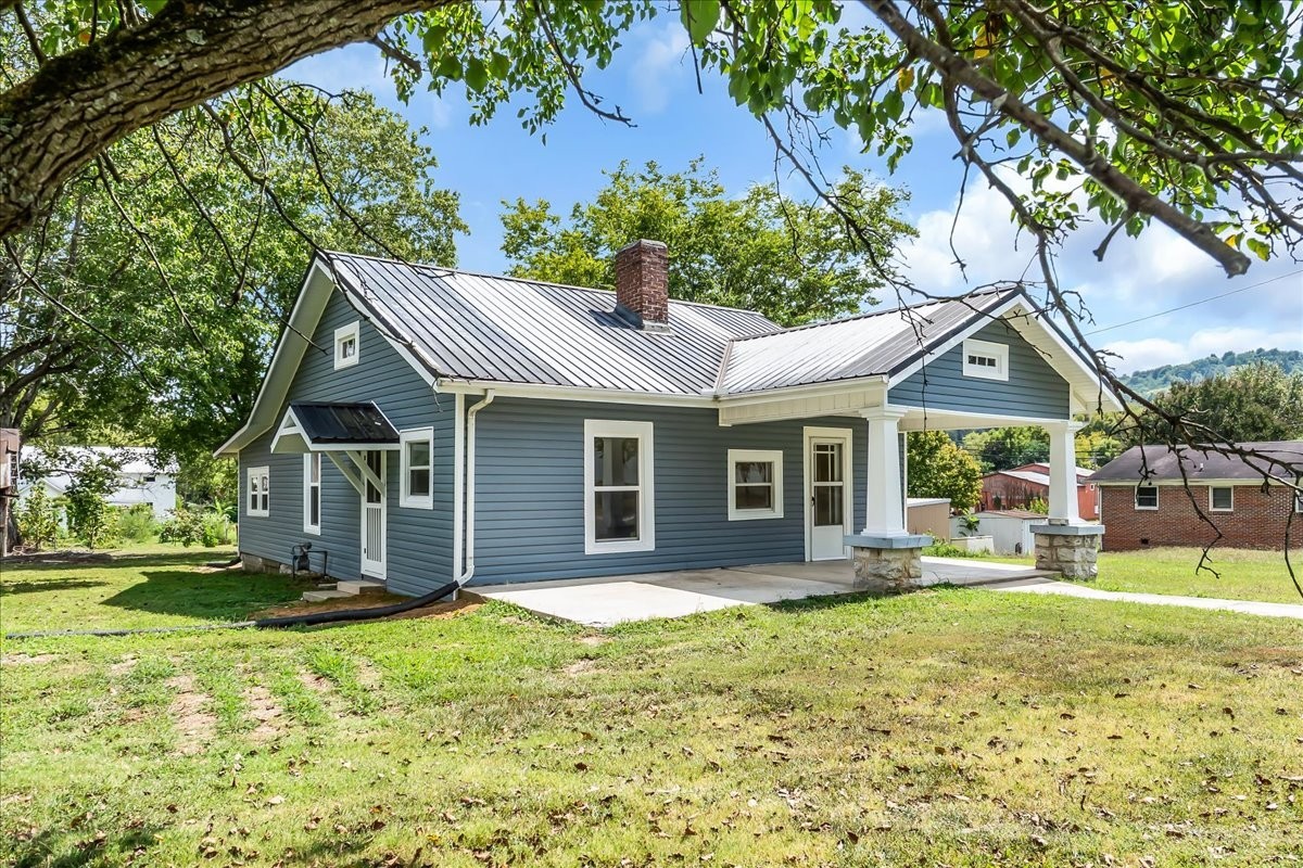 104 Locust Street Liberty, TN 37095 - Photo 2 of 57 a front view of house with yard and green space