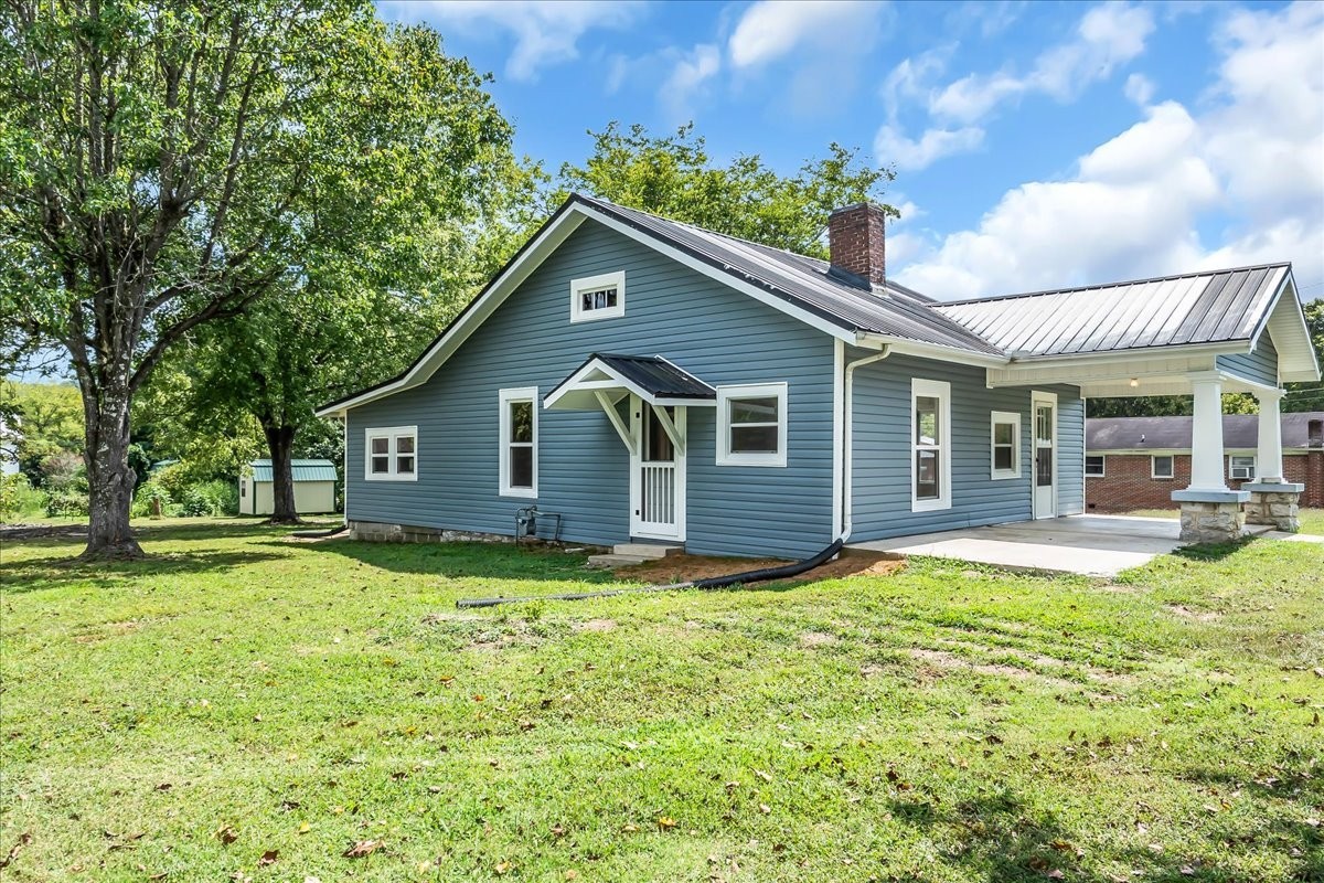 104 Locust Street Liberty, TN 37095 - Photo 3 of 57 a view of a house with a yard