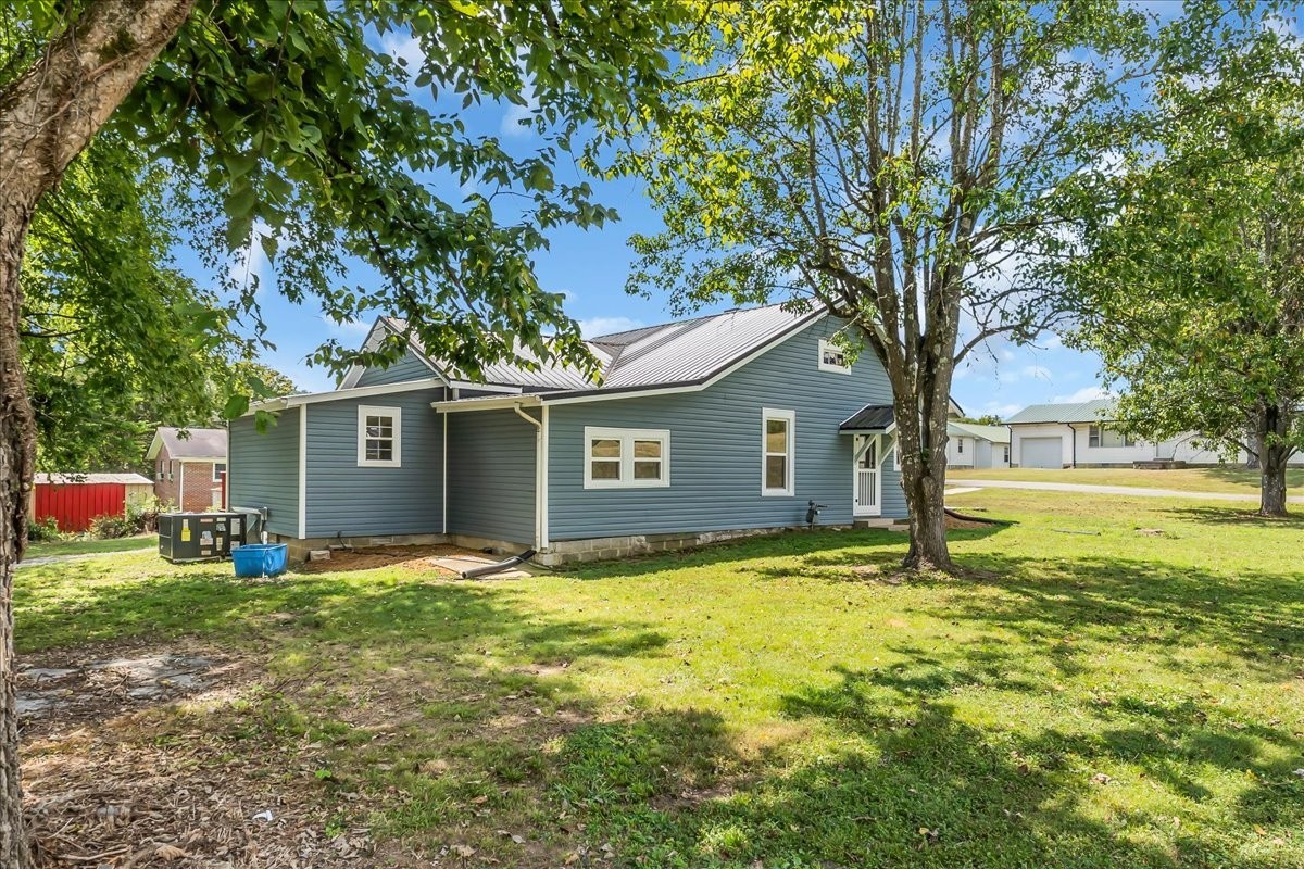 104 Locust Street Liberty, TN 37095 - Photo 43 of 57 a view of a house with a yard