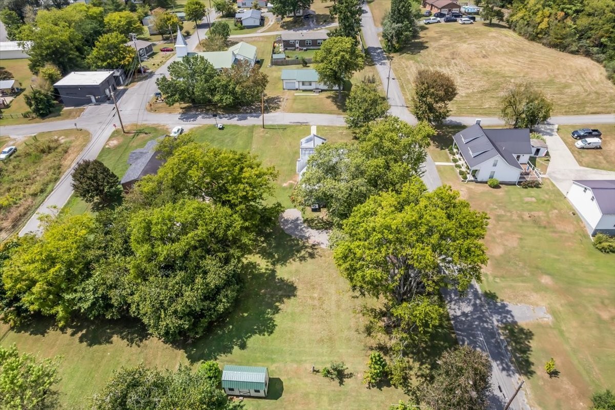 104 Locust Street Liberty, TN 37095 - Photo 46 of 57 an aerial view of residential houses with outdoor space