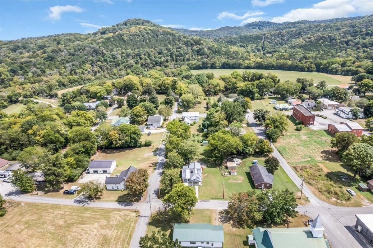 104 Locust Street Liberty, TN 37095 - Photo 47 of 57 an aerial view of a house with a yard