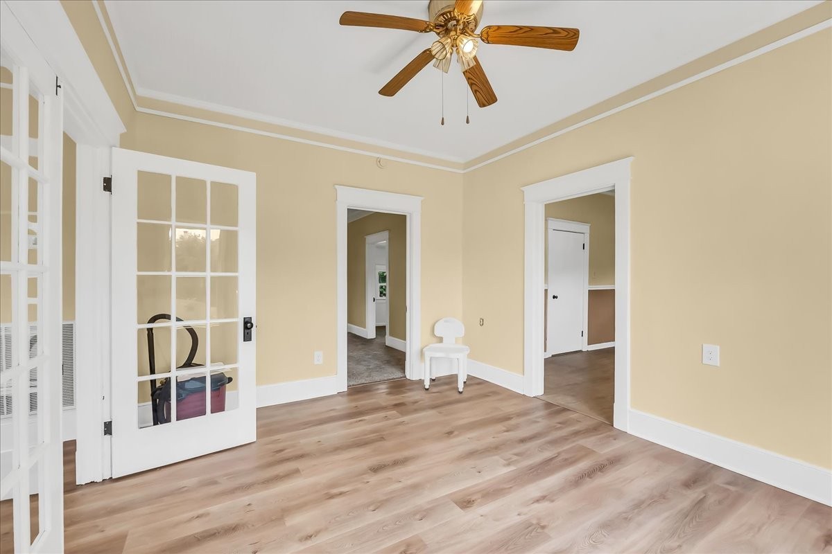 104 Locust Street Liberty, TN 37095 - Photo 8 of 57 an empty room with wooden floor closet and windows