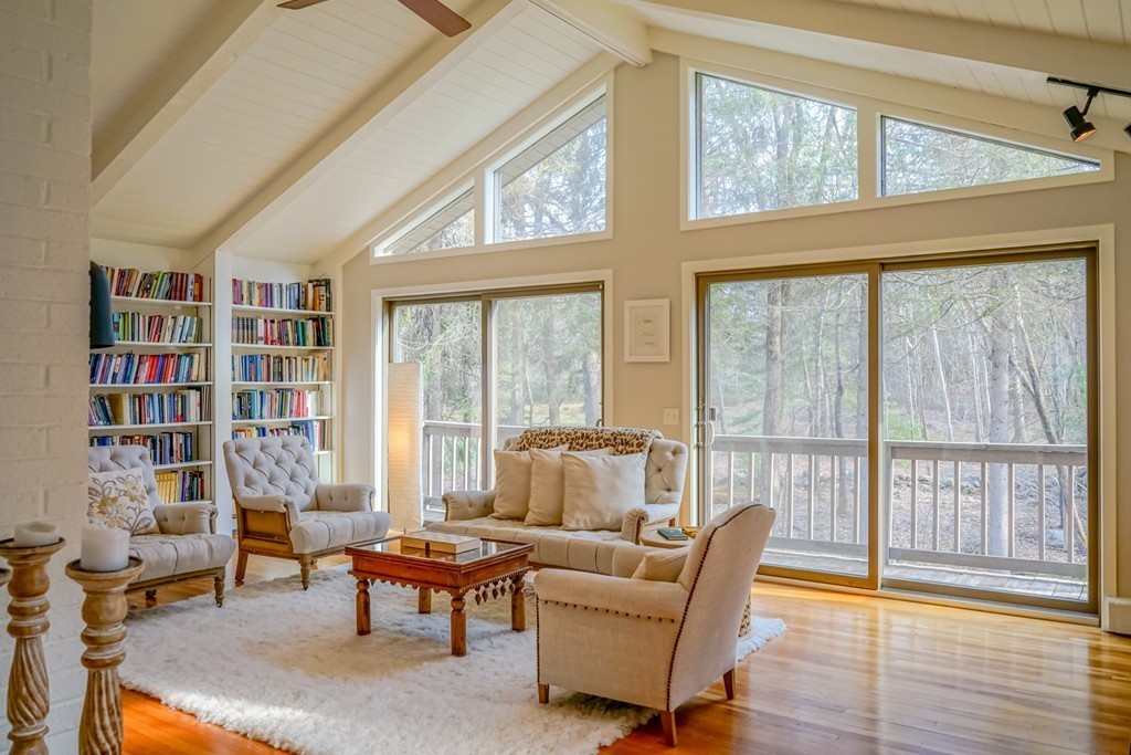 33 Sunset Road Carlisle, MA 01741 - Photo 2 of 27 a living room with furniture and a large window