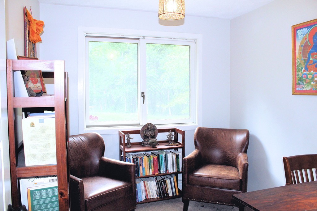 33 Sunset Road Carlisle, MA 01741 - Photo 21 of 27 a living room with furniture and a window